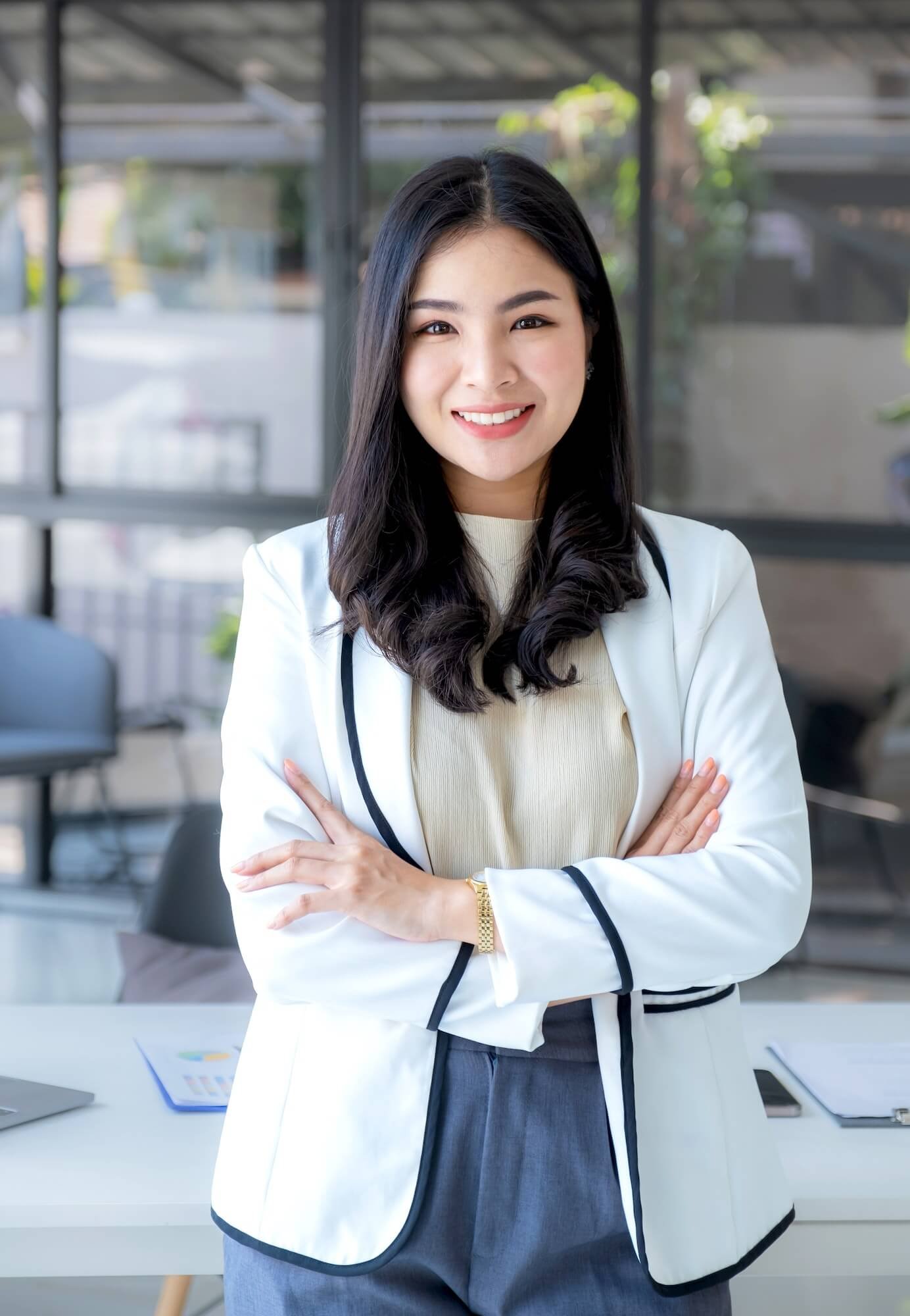business-woman-joyful-smiling-bookkeeper-s-standing-in-the-working-office.jpg
